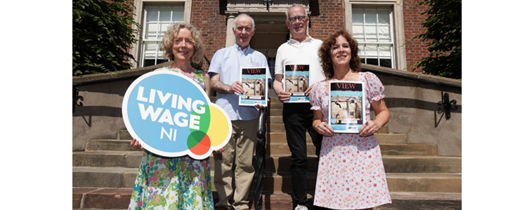 Mary Mcmanus, Kevin Higgins, Brian Pelan and Ruth Baxter standing on the steps of Clifton House on a sunny day.
